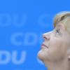 Angela Merkel kann aus ihrem Wahlsieg noch kein Kapital schlagen. SPD sowie Grüne scheuen noch vor einer Koalition mit der mächtigen Kanzlerin zurück.