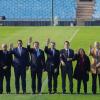 Die Bewerber aus Südamerika winken im Centenario-Stadion in Uruguay in die Kamera.
