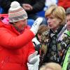 Rosi Mittermaier (links) bei der Ski-WM in Garmisch-Partenkirchen 2011 mit Pamela Beer-Knauth und Klaus Mayr. Mittermaier galt trotz ihrer Bekanntheit stets als bodenständig.