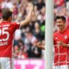 Thomas Müller (l) und Robert Lewandowski jubeln nach einem weiteren Treffer gegen den FC Augsburg.
