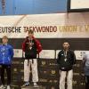 Vincent Hörmann (Bildmitte) erringt in seiner Gewichtsklasse im Taekwondo den deutschen Meistertitel. 
