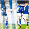 Schalkes Torschütze Suat Serdar (von links), Can Bozdogan und Amine Harit jubeln über Serdars Treffer zum 1:0.