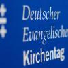 Das Logo des Deutschen Evangelischen Kirchentags ist am Rande der Pressekonferenz zum Programm des 38. Evangelischen Kirchentags zu sehen.
