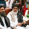 Mullah Abdul Ghani Baradar (l.), Vize-Chef der Taliban aus Afghanistan, und Taliban-Verhandlungsführer Sher Mohammad Abbas Staneksai.