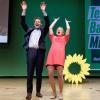 Katharina Schulze und Ludwig Hartmann stehen während der Landesdelegiertenkonferenz auf der Bühne.