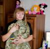 Bilder und Erinnerungsstücke sind Svitlana von ihrem Volodymyr geblieben. Die Armee hat ihr eine Uniform geschickt, wie sie ihr Mann trug.