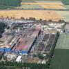 Das Stahlwerk in Herbertshofen (hier ein Luftbild vom Juni 2014) ist zu laut und deshalb in seiner Entwicklung eingeschränkt. Nun haben Gespräche bei der Regierung von Schwaben über die Zukunft des Unternehmens begonnen, die gleich am Anfang für Ärger sorgen. 