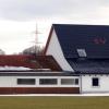 Das Vereinsgelände des Sportvereins Roggden mit dem Sportheim im Mittelpunkt. 	
