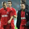 Kölns Star Lukas Podolski (l) ist mit der Situation beim FC alles andere als zufrieden. Foto: Carmen Jaspersen dpa