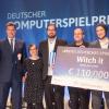 Markus Söder zeichnet die Gewinner in der Kategorie "Bestes Deutsches Spiel 2018" Tina Heitmann, Christoph Rienäcker, Nils Ohlig und Lukas Köhne aus.