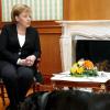 Nur einer hier ist hier entspannt. Merkel und Putin samt Hund im Jahr 2007. 