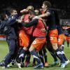 Die Spieler von Montpellier sind im französischen Fußball-Himmel angekommen. Foto: Guillaume Horcajuelo dpa