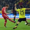 Der Schuss, der die Dortmunder ins Mark traf: Mario Götze erzielt das 1:0 für den FC Bayern beim BVB.