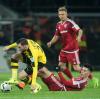 Mit einem mühsamen Pflichtsieg gegen den FC Ingolstadt hat Borussia Dortmund den dritten Platz in der Fußball-Bundesliga gefestigt. 