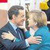 In der Begrüßung äußerlich herzlich, in der Sache aber weit hart: Nicolas Sarkozy und Angela Merkel gehen in der Atomfrage unterschiedliche Wege.  