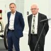 Porsche-Chef Oliver Blume (links) und der grüne Ministerpräsident Winfried Kretschmann. .