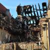 Nach dem verheerenden Brand in dem Haus in der Karolinenstraße geht der Wiederaufbau voran. Vor Ort gewähren die Architekten einen Blick in das Gebäude.