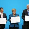 Die Parteivorsitzenden Horst Seehofer (CSU), Angela Merkel (CDU) und Sigmar Gabriel (SPD.