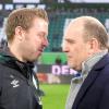 Vertraut auf Trainer Florian Kohfeldt (l): Wolfsburgs Geschäftsführer Sport Jörg Schmadtke.