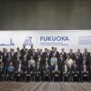 G20-Finanzminister stehen für ein Gruppenfoto zusammen.