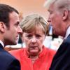 Der französische Präsident Emmanuel Macron (links), Bundeskanzlerin Angela Merkel und der US-amerikanische Präsident Donald Trump.