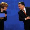 Verständnisschwierigkeiten? Angela Merkel und Viktor Orbán bei ihrer Pressekonferenz in Budapest.