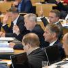 Abgeordnete von CDU, FDP und AfD stimmen im Thüringer Landtag für den Gesetzentwurf der Union.