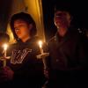 epaselect epa04462529 Nicole Nuval (L) and Pon Nuth from Lynwood, Washington, stand outside The Grove Church during a vigil that drew hundreds of people, after a school shooting that occurred at Marysville-Pilchuck High School earlier in the day in Marysville, Washington, USA, 24 October 2014. One girl and her killer, a fellow student, were dead in the high school shooting in the north Pacific state of Washington, officials said. The shooter targeted five people in the head at close range before turning the gun on himself, according to police and a hospital official. Four surviving victims were critically injured in the head. They are all under the age of 18 and were undergoing surgery. EPA/MATT MILLS MCKNIGHT +++(c) dpa - Bildfunk+++