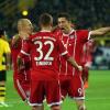 Arjen Robben, Joshua Kimmich und Robert Lewandowski bejubeln einen Treffer gegen Borussia Dortmund.