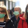 Mundschutz auf dem Vormarsch: In Mailand versuchen sich die Menschen gegen eine Ansteckung zu schützen. 