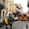 Feuerwehrleute sind nach der Explosion im Viertel Chatrons im Einsatz.