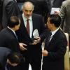 Syriens UN-Botschafter Baschar Dschaafari (Mitte) im Gespräch mit Chinas Vertreter im UN-Sicherheitsrat, Li Baodong (links). China hat gegen die Syrien-Resolution gestimmt. 