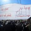 Teilnehmer einer Demonstration gegen das Assad-Regime im Viertel Kafr Susa in Damaskus. Foto: Undatiertes Bild der oppositionellen Organisation "Syrian Revolution General Commission" (SRGC) dpa