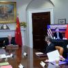 US-Präsident Joe Biden M beim  virtuellen Treffen mit dem chinesischen Präsidenten Xi Jinping im Weißen Haus. Im Taiwan-Konflikt brachte das Gespräch eine leichte Entspannung. 