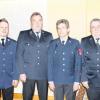 Die Feuerwehr ehrte verdiente Mitglieder (von links): Kommandant Mario Mack, Wolfgang Wall, Johann Mack und Ottmar Weggenmann.  