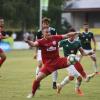 Maximilian Käser (vorne in Rot) schoss gegen Schweinfurt zwei Tore für den TSV Rain. 	