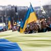 Ein Land leidet: Menschen nehmen am ersten Jahrestag der russischen Invasion in der Ukraine an einem Solidaritätsmarsch teil. 