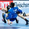 Eine Szene vom vierten Spieltag der Handball-Weltmeisterschaft. Deutschlands Paul Drux im Zweikampf mit Dika Mem aus Frankreich. Die Spiele Deutschlands gerieten zum Quoten-Hit im Fernsehen. 	