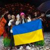 Die Gruppe Kalush Orchestra aus der Ukraine jubelt über den Sieg des Eurovision Song Contest (ESC). 2023 wird er in Großbritannien ausgetragen.