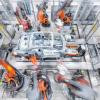 KUKA-Roboter wirken an der Herstellung von Mittel- und Oberklassewagen von Audi mit.