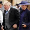 Boris Johnson, ehemaliger Premierminister von Großbritannien, und seine Frau Carrie Johnson kommen vor der Krönungszeremonie in der Westminster Abbey an.