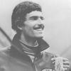 Mit strahlendem Lächeln und einem Prachtexemplar von Schnurrbart präsentiert der US-Schwimmer Mark Spitz im September 1972 seine sieben Goldmedaillen.