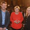 Alexandra Holland, Angela Merkel und Gregor Peter Schmitz beim Augsburger Allgemeine Forum live.