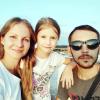 Kateryna und Volodymyr Druzhenets mit ihrer siebenjährigen Tochter Anna im letzten Sommerurlaub in der Nähe von Sumy.  