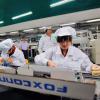 Chinesische Mitarbeiter des Apple-Zulieferers Foxconn arbeiten im Lunghua-Werk.