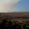 Touristen bekommen im Süden der Insel Gran Canaria nur wenig vom Waldbrand im Nordwesten mit. Lediglich Rauchschwaden sind zu sehen. 