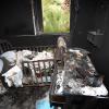 Der Schutzraum dieses Hauses im Kibbuz Nir Oz in einem zerstörten Haus ist ausgebrannt. 