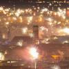 Silvesterfeuerwerk erhellt den Himmel über der Innenstadt.