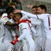 Die Bayern-Spieler feiern den Last-Minute-Sieg beim SC Freiburg.