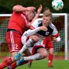 Es ging mächtig zur Sache im Landesliga-Derby. Hier kämpfen der Blausteiner Marius Veith und der Bucher Johannes Zott (rotes Trikot) um den Ball. 	